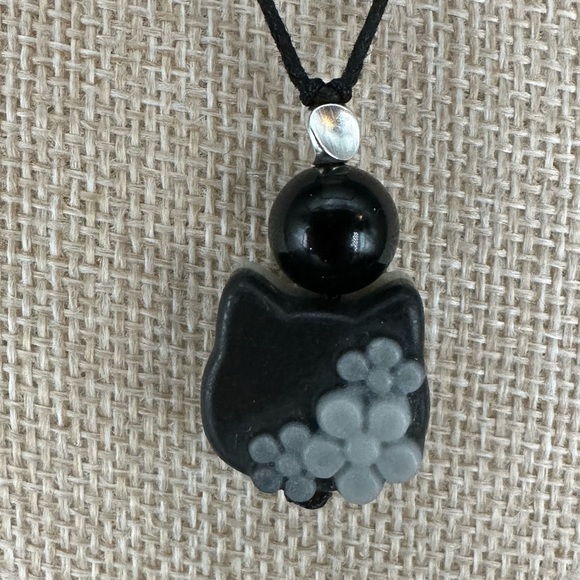 Tai Chi Stone Cat Head and Flowers Pendant with Onyx on Black Adjustable Rope - Picture 13 of 13